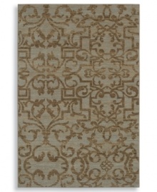 A blend of traditional and contemporary design elements, this unique piece displays an inviting, weathered look in chic blue-green colorways. Plush New Zealand wool gives the rug a soft surface that holds up in the busiest rooms in your home.