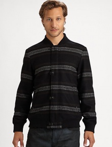 Finely knit wool blend shapes a yarn-dyed, zip-front sweater covered in masculine, modern stripes.Zip front40% acrylic/30% wool/30% polyesterDry cleanImported