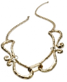 Classic elegance in antiqued tones, by Bar III. The scrolling design of this statement necklace leads you on a path of pure sophistication. Crafted in antiqued gold tone mixed metal. Approximate length: 24 inches + 2-inch extender.