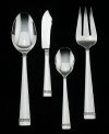 An intricate braided design between two solid bands makes a sophisticated statement at any table. Detailed and balanced this flatware is perfect for both a traditional or modern setting. 4-piece hostess set includes 1 butter knife, 1 large serving spoon, 1 large serving fork and 1 small serving spoon.