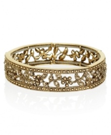 Heighten your outfit's appeal with this intricately designed bracelet by Monet. In goldtone mixed metal and crystal accents. Approximate diameter: 2-3/4 inches. Stretches to fit.