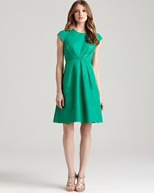 Catering to this season's ladylike trend, this kate spade new york dress emboldens your everyday style with a vibrant, retro silhouette. Add a dash of pearls and a pair of heels for full-on feminine glamour.