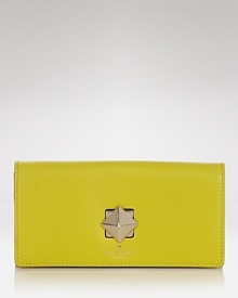 kate spade new york's ever-chic wallet gets prettier in luxurious leather with a bold turnlock closure. Equal parts practical and playful, it's perfect companion for purse or palm.