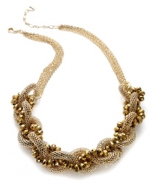 Wrap your neckline in bohemian beauty. This Alfani necklace features a twisted silhouette with 12k gold-plated mixed metal mesh and faceted beads. Approximate length: 18 inches + 3-inch extender.