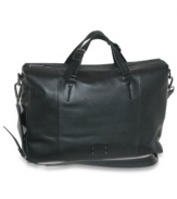 Handsome business brief bag by Dopp features leather trim pockets and gunmetal hardware.