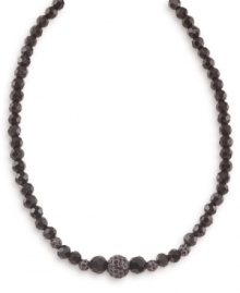 Go for dark drama with this sleek Carolee necklace. Graduated, faceted jet beads (8-10 mm) gleam alongside crystal-accented fireballs. Crafted in hematite-plated mixed metal. Approximate length: 16 inches + 2-inch extender.