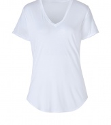 Get the Helmut Lang look by grounding your basics with wardrobe essentials like this super soft V-neck tee from Helmut - V-neckline, short sleeves, longer shirttail hemline in front - Loosely fitted - Wear with figure-hugging separates and edgy leather accessories