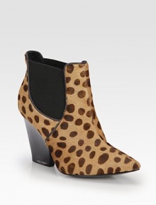 A strong stacked heel lifts this feline-inspired ankle boot of leopard-print calf hair, with leather trim and easy elastic panels. Stacked heel, 3¾ (95mm)Leopard-print calf hair upper with leather trim and side elastic panelsPull-on styleLeather lining and solePadded insoleImported