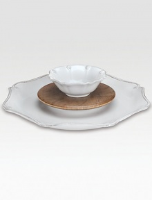 Coordinating set includes durable stoneware serving platter with center opening that's fit for the accompanying wood cutting board insert (for cheese) or chip-and-dip bowl. Machine wash Platter: 15 diam Imported