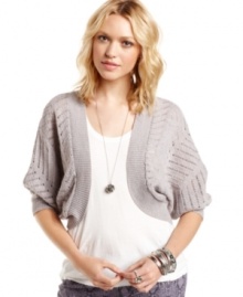 Slip on this open-knit shrug from Cotton Emporium for a simple way to add fresh style to your look! Cool metallic threading makes it a cute piece for day or night.