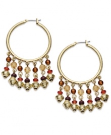 Colorful beads fashioned from glass, resin and wood create head-turning style on these Lauren Ralph Lauren hoop earrings. Set in 14k gold-plated mixed metal. Approximate drop: 2-1/4 inches.