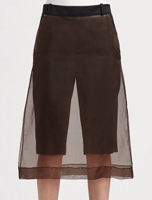 A perfect mix of roadster and romance, edgy biker shorts with a zip-on silk skirt.Waistband with belt loopsSide zip closureZip-on sheer skirt overlayShorts: rise, about 10; inseam, about 14Skirt: about 29 from natural waistViscose/silkDry cleanImportedModel shown is 5'10 (177cm) wearing US size 2. 