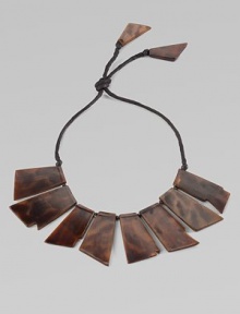 This bold, statement-making design is made up of glossy, geometric tortoise panels.HornCotton cordLength, about 8Pendant length, about 2½Imported