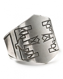 Add cool-girl edge to your look with this thunderbird-engraved adjustable cuff from Low Luv by Erin Wasson.