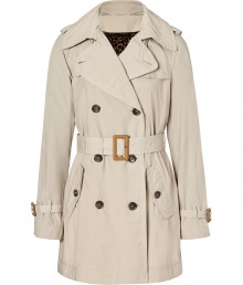 D&G Dolce & Gabbana modernizes the classic trench with a feminine silhouette and a bold leopard print lining - Large spread collar, epaulets, double-breasted, belted waist, flap pockets, belted cuffs, back storm flap and vent - Pair with a classic sheath and platform pumps or an elevated jeans-and-tee ensemble