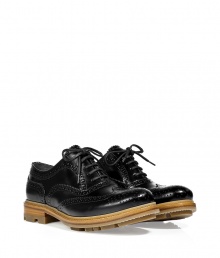 Take your menswear-inspired look to the next level in these modernized leather brogues from Jil Sander - Classic brogue style with perforated details and wingtip styling - Lace up, contrasting neutral hued sole, low chunky heel - Style with cropped trousers, a draped tee, and an oversized blazer