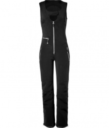 Make a chic statement on the slopes in Jet Sets ultra modern stretch ski overalls, finished with a flattering cut guaranteed to show off your sporty side in style - Snapped scooped neckline, sleeveless, exposed front zip, zippered pockets, seamed knees, zippered ankles, inside elasticized cuff lining with silicon band for hold - Form fitting through the thigh, straight leg, slightly flared ankle - Wear with form-fitting turtlenecks and glamorous oversized sunglasses