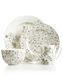 A muted palette tones down the busy florals of Song Meadow dinnerware in place settings that, in dishwasher- and microwave-safe porcelain, will make busy cooks sing. Featuring contemporary silhouettes in the style of Martha Stewart Collection.