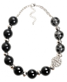 Boldly beaded. Haskell's stunning collar necklace combines shiny black beads, pinstriped beads, and a sparkling crystal fireball for bold shimmer. Set in silver tone mixed metal. Approximate length: 19 inches + 3-inch extender. Approximate drop: 1 inch.