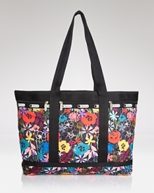 LeSportsac's signature nylon tote flaunts vivid flowers and plenty of room for must-haves. The color-clad bag takes you on weekend errands or jet-setting adventures with stylish sensibility.