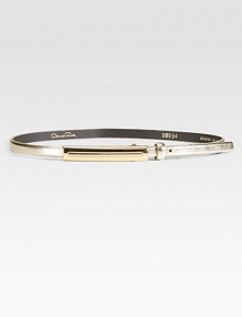 This slim, metallic leather style fastens with a chic, narrow rectangular buckle.About 1 wideLeatherMade in USA