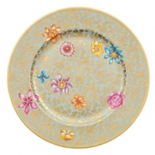 Villeroy & Boch's Aureaus dinnerware is a decadent delight: golden filigree is lavished on an aquamarine decoration that stepped right off the fashion runway. Bursting lotus blossoms adorn plates and service pieces, adding shades of fuchsia, tangerine and sapphire. Aureus is a modern classic representing the convergence of past and present. Bone china with gold details. Dishwasher safe.