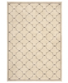 A classic Indian ogee design is brought to life in lush hues of ivory and grey in this Zanzibar area rug from Sphinx. Its streamlined, low-cut pile and durable construction offer a handsome, lasting finish to any room. (Clearance)