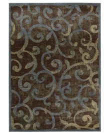 Retreat to a comfortable new space. This distinctive rug offers a slightly worn look, graced with a beautiful vinery pattern in varying shades of blue, beige and black. Created from a durable blend of polypropylene and acrylic, the Expressions rug is designed to retain both its color and its luxuriously dense weave for years to come.