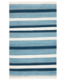 An ultra-modern design inspired by artisan flat weave carpets of Turkey and India, the Narragansett Stripe area rug from Lauren Ralph Lauren is woven by hand in India of luxurious banana silk with a hint of cotton.