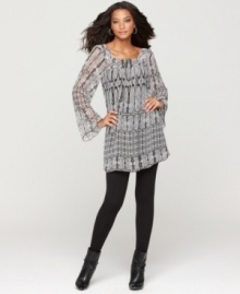 Sheer sleeves and an intricate print make One World's flowing dress a unique piece for any closet. Perfect with knee-high boots and leggings!