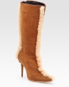 Buttery suede style with front-to-back shearling trim for a luxuriously plush look. Self-covered heel, 3 (75mm) Shaft, 13 Leg circumference, 15 Suede upper Shearling trim Leather lining Buffed leather sole Padded insole Made in ItalyOUR FIT MODEL RECOMMENDS ordering one half size up as this style runs small. 