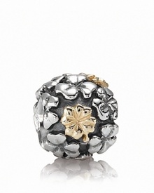 This PANDORA charm is lucky find -- a sterling silver field of clovers with four-leaf varieties in 14K gold.