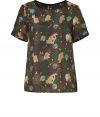 Work a playful print into your workweek repertoire with Marc by Marc Jacobs eye-catching silk tee - Round neckline with black trim, short sleeves, stitched cuffs, button-down back - Loose fit - Wear with jeans and flats, or tucked into a pencil skirt with heels