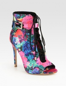 Channel street-chic vibes wearing this satin ankle boot freshened with a lush floral print and suede laces. Self-covered heel, 4½ (115mm)Satin upper with suede lacesAdjustable ankle strapLeather lining and solePadded insoleImported