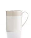 Versatility is king in the amazingly dishwasher- and oven-safe Classic Band mug. Stick with clean lines in soft grey and white porcelain or mix and match with floral Lisbon dinnerware, also by Martha Stewart Collection.