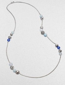 From the Elements Collection. A delicate, sterling silver chain link with smooth blue chalcedony, aquamarine, moon quartz and and multi-textural sterling silver beads in a clustered station design. Blue chalcedony, aquamarine, moon quartz Sterling silverLength, about 40Lobster clasp closureImported 