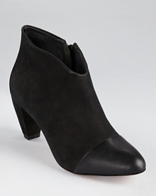 A modern update on a timeless classic, Loeffler Randall's well-heeled Nanette booties showcase a cap-toed silhouette in the softest leather.