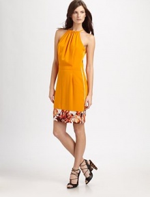 A gathered halter-neck shapes this vibrant frock finished with lush floral trim.Gathered halter necklineSleevelessHigh waistGathered pleatsSide zipperAbout 20½ from natural waistPolyesterDry cleanImportedModel shown is 5'10 (178cm) wearing US size 4.