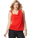 Accented by a draped neckline and goldtone hardware, Calvin Klein's sleeveless plus size top is a versatile layering piece that will take you from day to night!