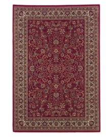 A long runner that is ideal for hallways and entryways. Inspired by the lovely Sarouk carpets of ancient Persia, this rug features an intricate floral motif in ivory, sage green and accents of soft blue against a rich red ground.