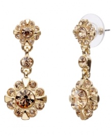 Go for the gold! Crafted in gold tone mixed metal, Monet's drop earrings dazzle with rich golden brown topaz-colored glass accents in a feminine floral pattern. Approximate drop: 1-3/8 inches.