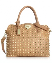 Elegance with an edge. Stud accents give this classic satchel design uptown rocker-chic appeal. Spacious, versatile and destined to be your go-to silhouette of the season. From Steve Madden.