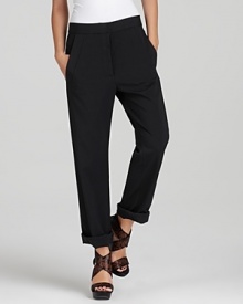 These staple DIANE von FURSTENBERG black pants prove basics don't have to be boring. With a simple self-tie at the back waist and rolled cuffs, this effortless style is a no-fail choice for the transitional season.