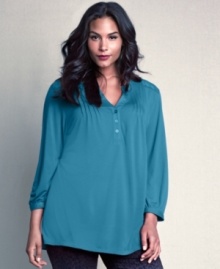 Leave a lasting impression in Style&co.'s long sleeve plus size top, accented by a lace back. (Clearance)