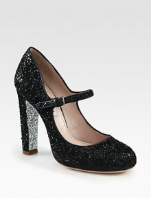 Dressed-up version of the timeless Mary Jane pump in sparkling glitter for a look that truly shines. Self-covered heel, 4½ (110mm)Glitter-coated leather upperAdjustable ankle strapLeather liningGlitter-coated leather solePadded insoleMade in Italy