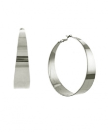 Looking for a hoop style with a twist? Vince Camuto takes the traditional hoop earring to a new level with a slightly tapered edge. Crafted in silver tone mixed metal. Approximate diameter: 2 inches.