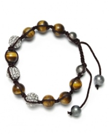 Spiritual-inspired bracelets are all the rage this season! Snap up this hot style from Ali Khan featuring semi-precious tiger's eye beads and pave glass fireballs on a trendy black cord. Bracelet adjusts to fit the wrist. Approximate diameter: 2 inches. Approximate length: 12-1/4 inches.