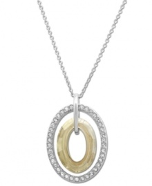 Go for the gold! Swarovski's Logan Golden Shadow crystal pendant necklace features an dramatic double oval silhouette. Adorned with sparkling clear pavé crystals, it's made in mixed metal. Approximate length: 15 inches. Approximate drop: 1 inch.