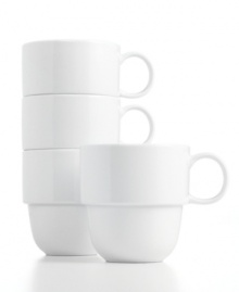 Keep the table and kitchen clean with Stakks dinnerware. The dishes from Tabletops Unlimited include these pure white porcelain mugs for everyday use, in a shape designed for efficient stacking and storage. Ideal for apartment living!