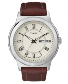 Complete a polished look with this handsome dress watch by Timex. Brown croc-embossed leather strap and round silver tone mixed metal case. Ivory dial features black Roman numerals at markers, printed minute track, day and date window at three o'clock, luminous hands, and logo. Quartz movement. Water resistant to 50 meters. One-year limited warranty.